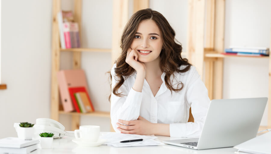 A manager is sitting calmly taking a break from work